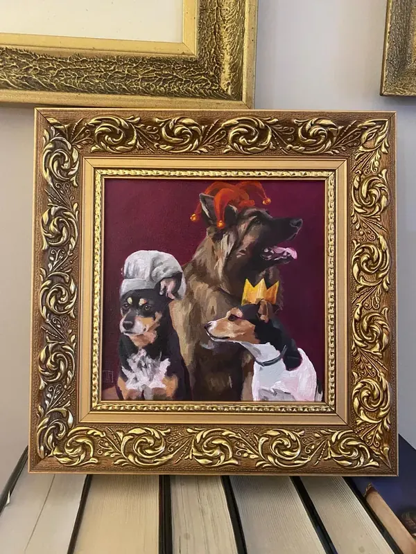 Oprawiony portret z trzema psami